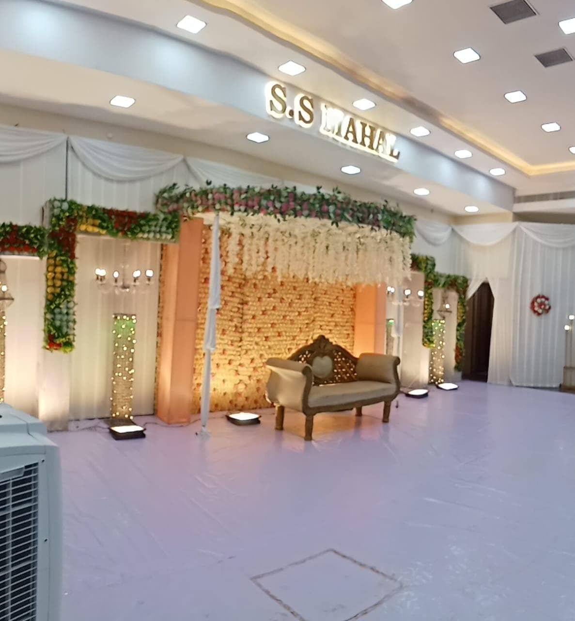 White floral stage at S.S Mahal