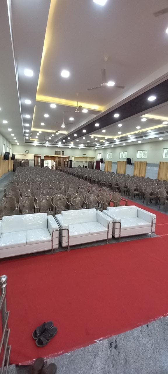 Sofas near the stage at S.S Mahal
